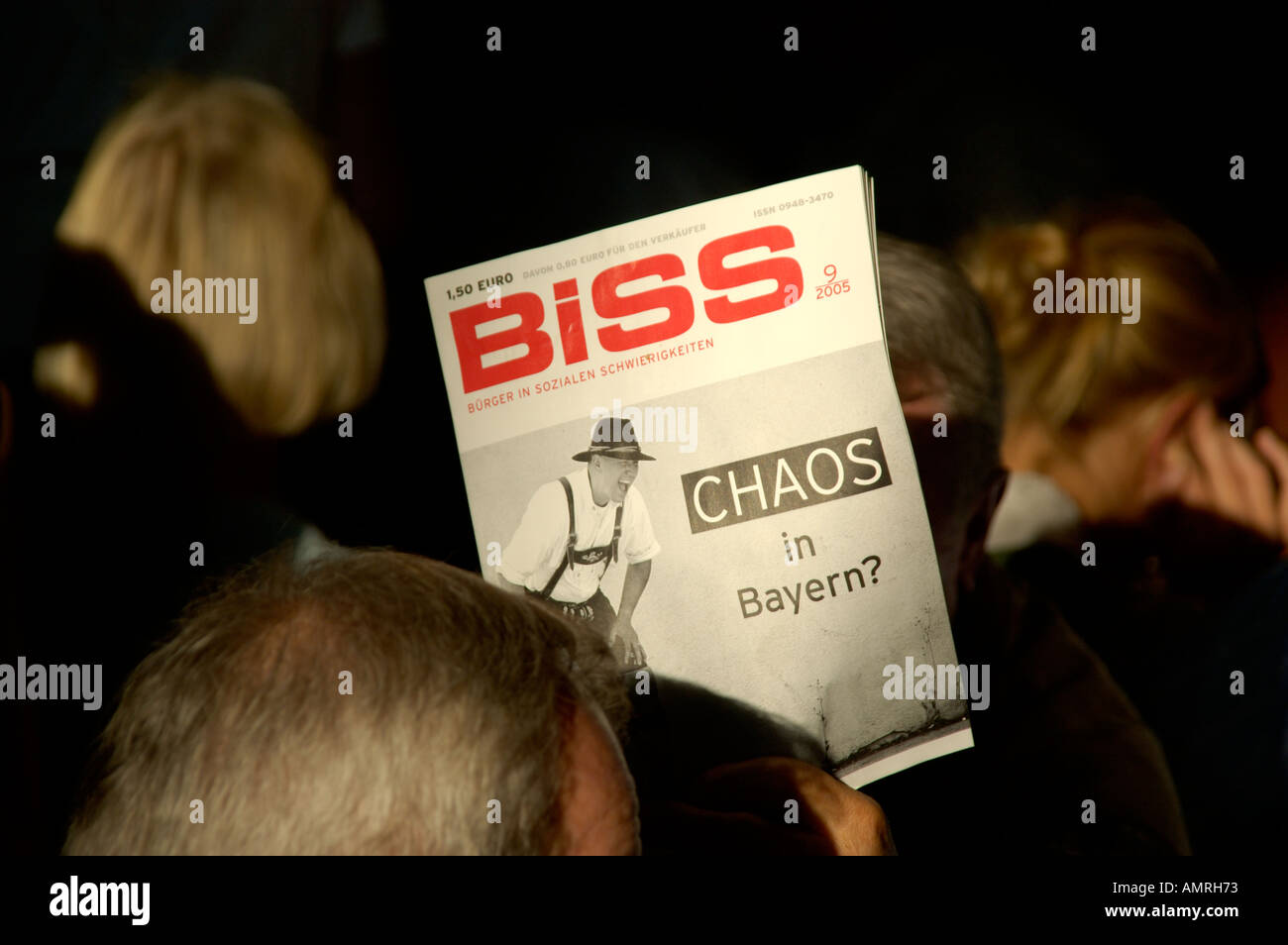 Magazine Biss among heads Chaos in Bayern Octoberfest Munich Bavaria Germany Stock Photo