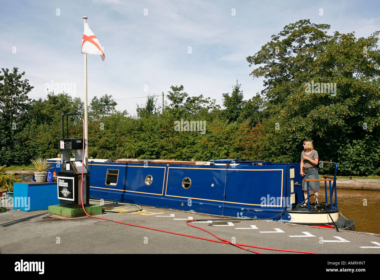 Canal boat refuelling Stock Photo