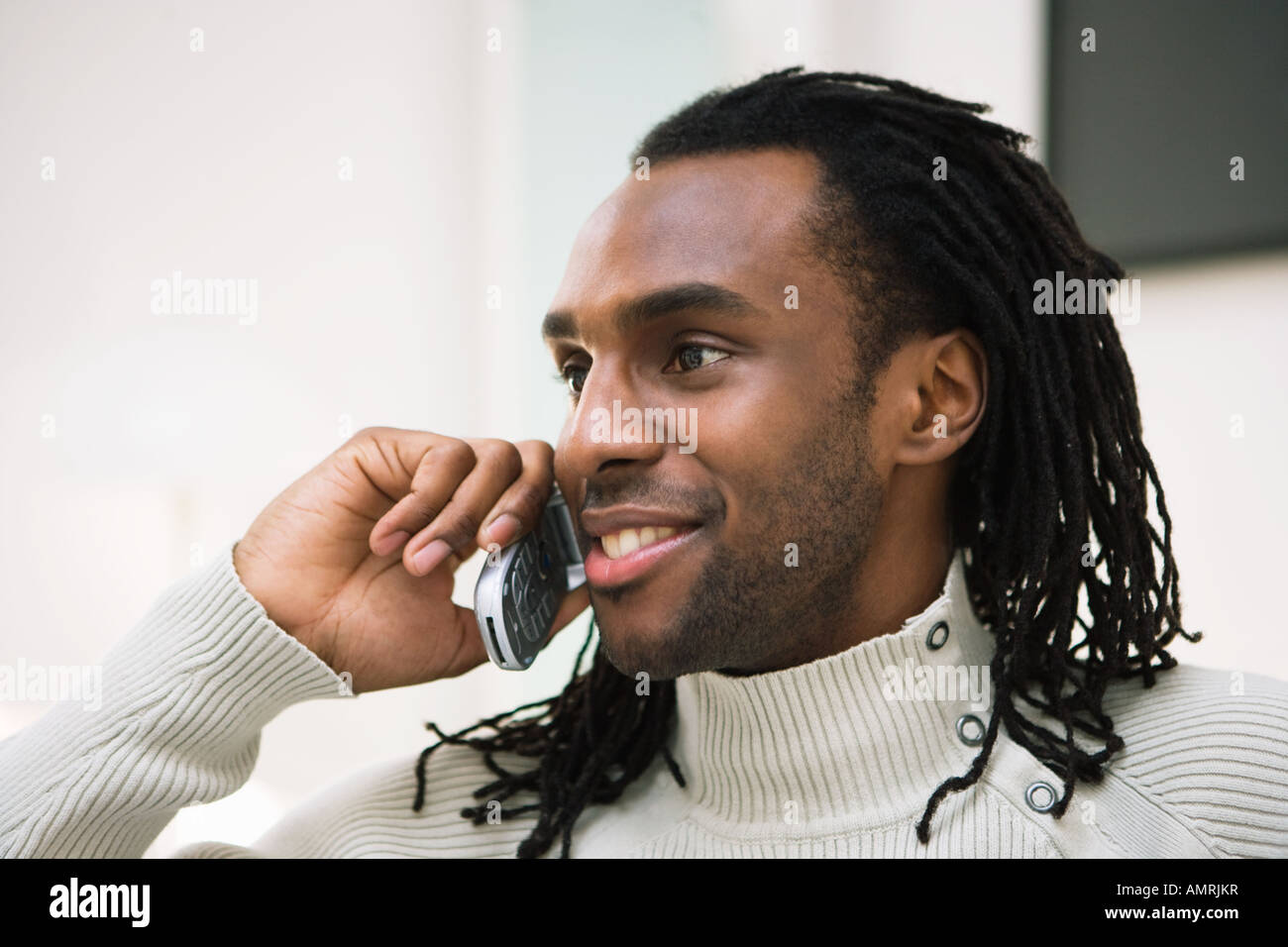 African man talking on cell phone Stock Photo
