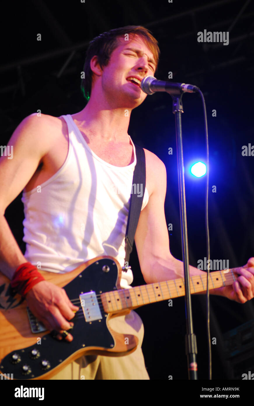 Singer and guitarist Dan Gillespie Sells, bassist Richard Jones, drummer Paul Stewart of The Feeling at Wychwood Festival 2006 Stock Photo