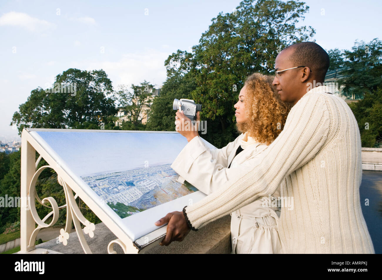 African couple pointing Stock Photo - Alamy