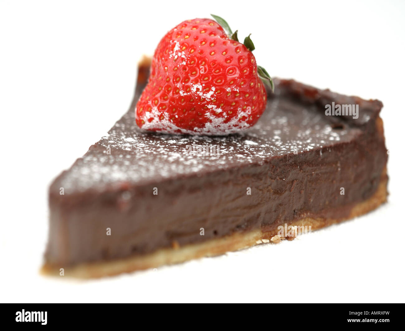 Cake slice with strawberry on top Stock Photo - Alamy