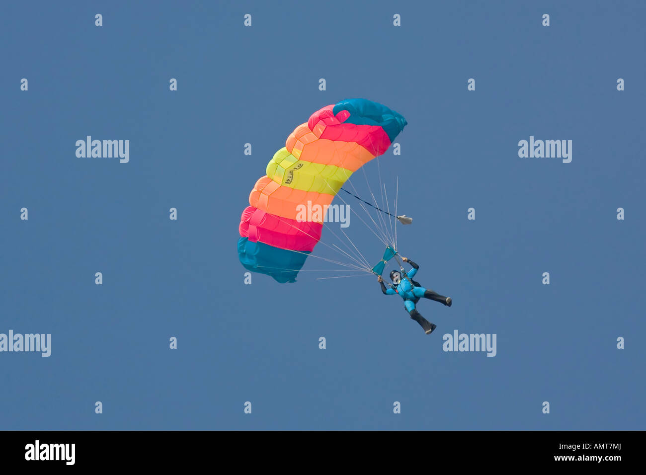 Skydiver With Rainbow Colored Parachute Stock Photo Alamy