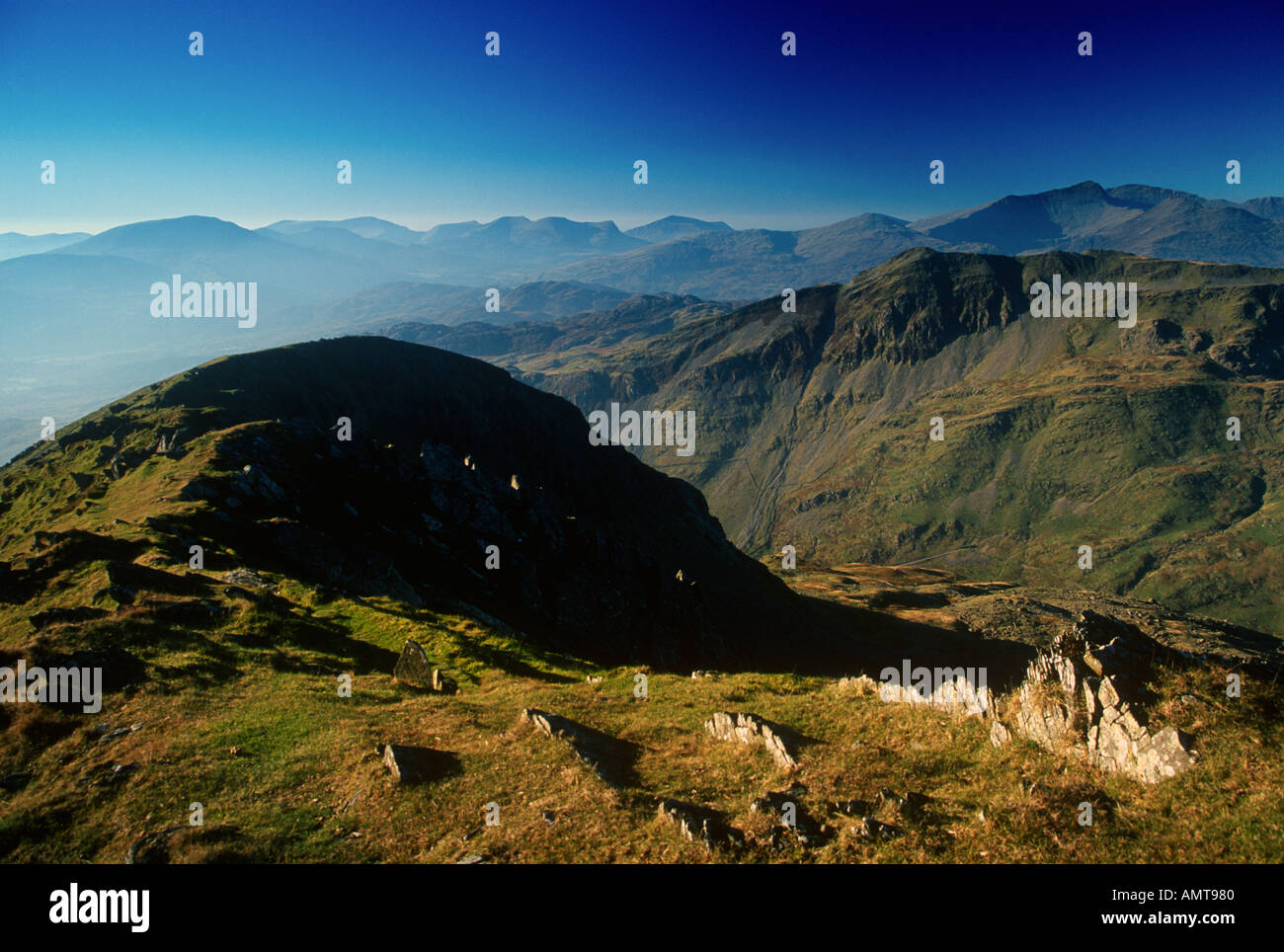 Moelwyn Mawr Summit Snowdon and Cnicht Mountains behind Snowdonia North West Wales Stock Photo