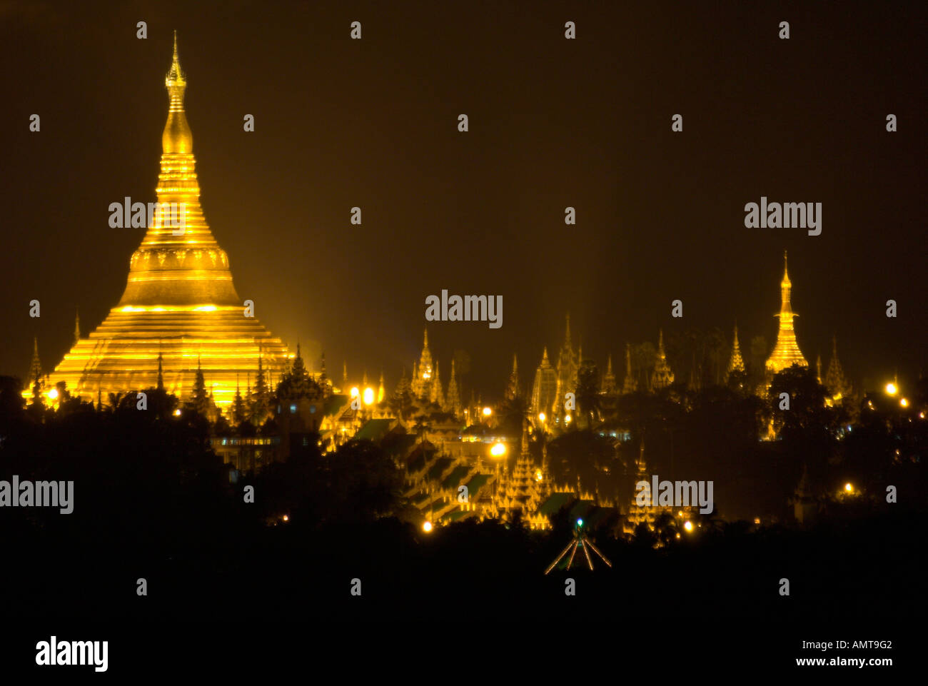 Myanmar Burma Yangon Shwedagon Paya at night view from afar with lit up pagoda Stock Photo