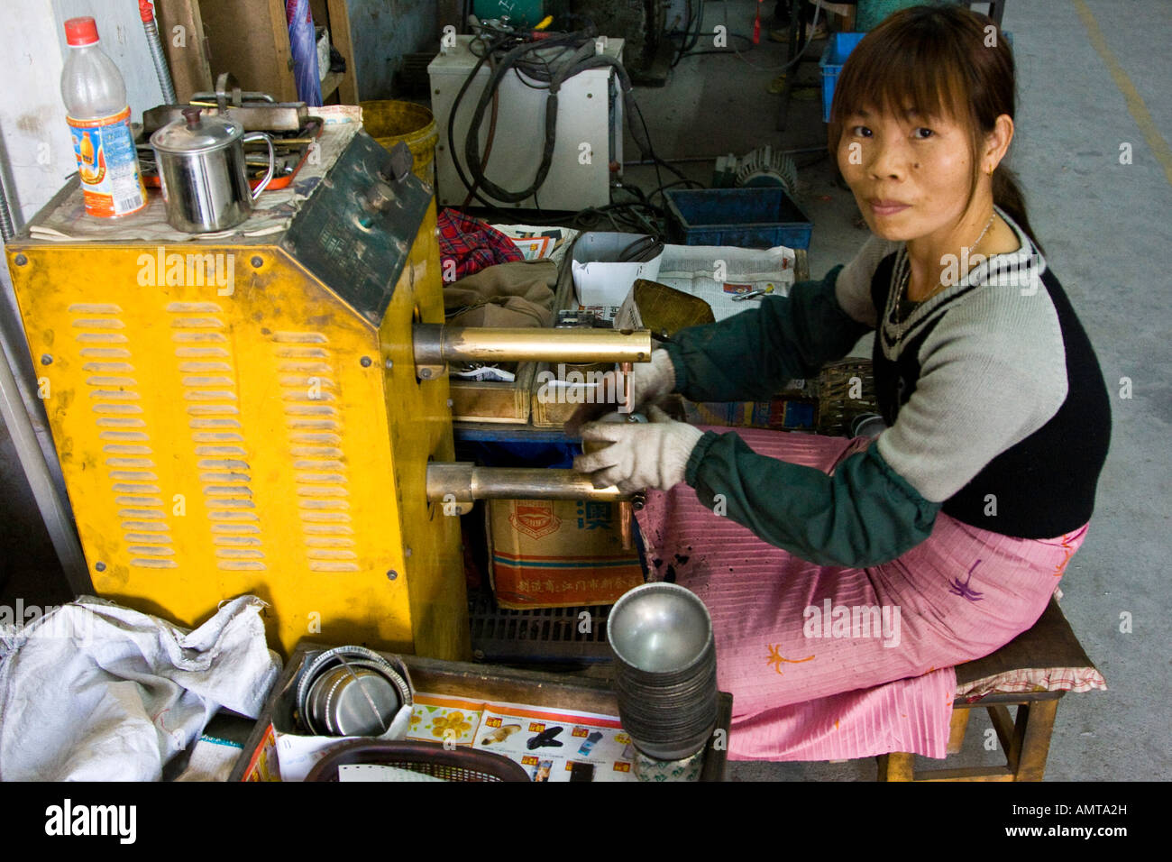 chinese-woman-working-on-a-manufacturing