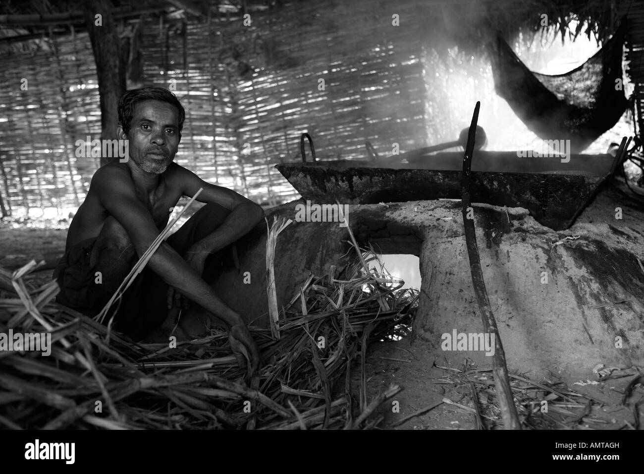 Processing sugarcane near Nayagarh, Orissa, India Stock Photo