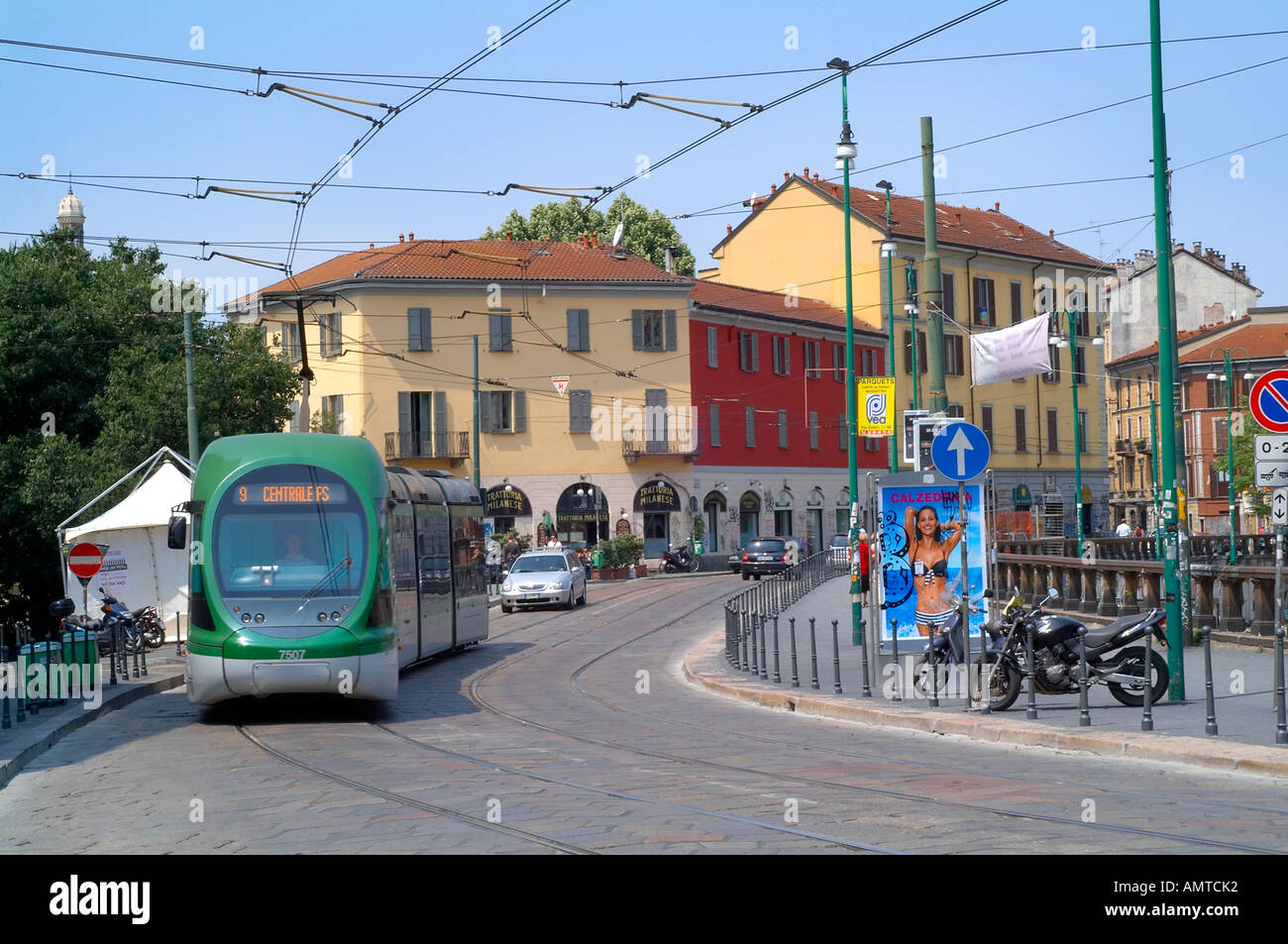 Tram, in a street in Naviglio, Milan Stock Photo