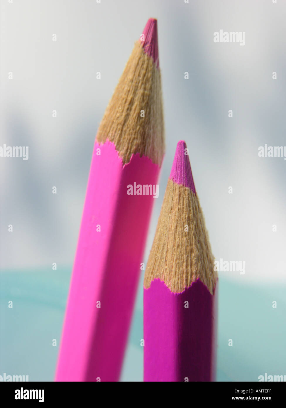Two pink crayons hi-res stock photography and images - Alamy