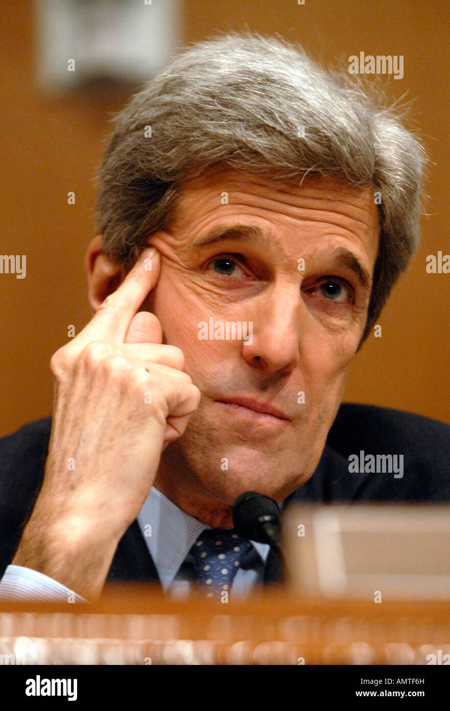 Senator John Kerry D MA speaks to Secretary of State Condoleezza Rice during a Senate Foreign Relations Committee hearing in Was Stock Photo