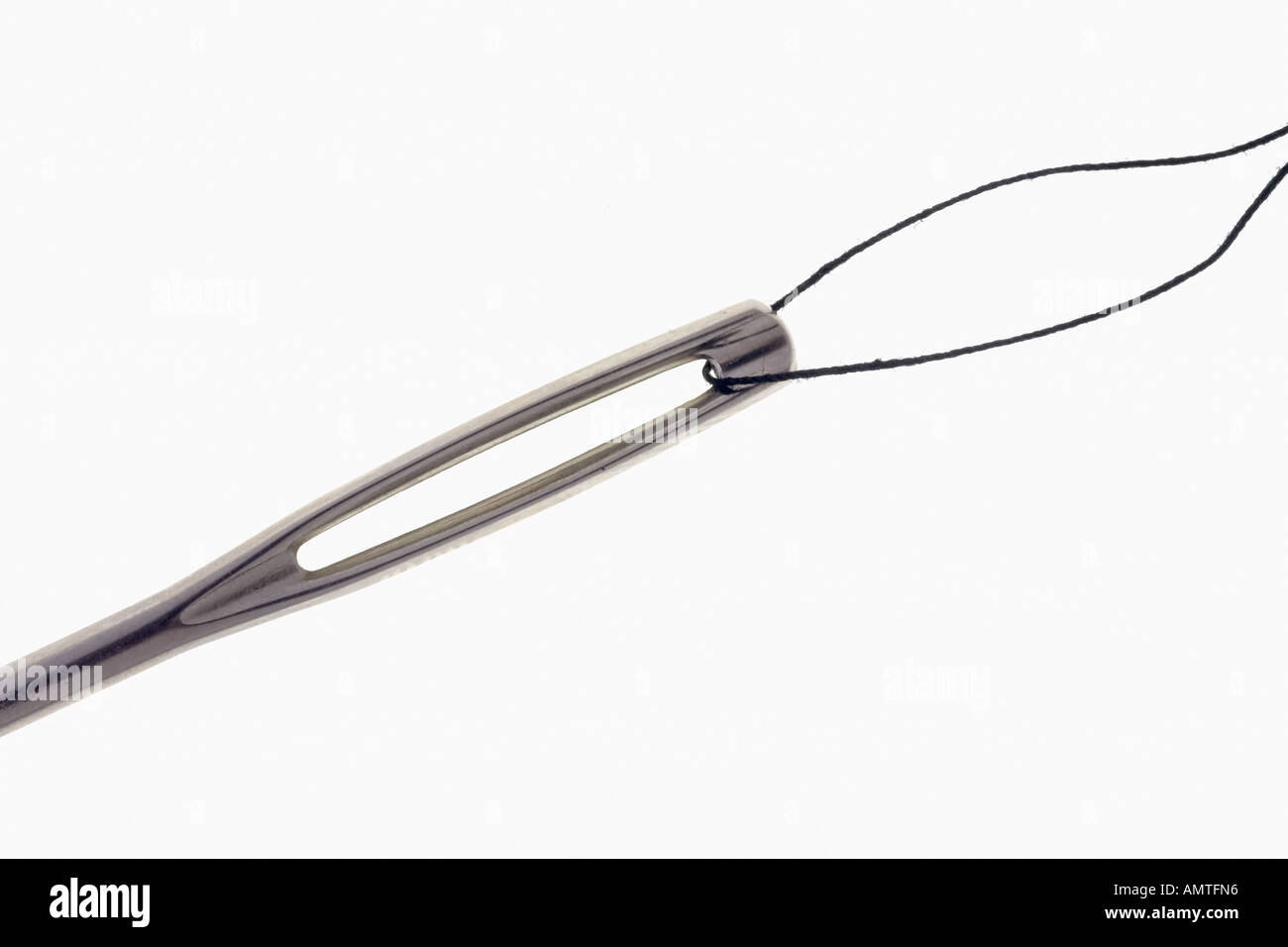 Sewing needle, eye of a needle Stock Photo Alamy