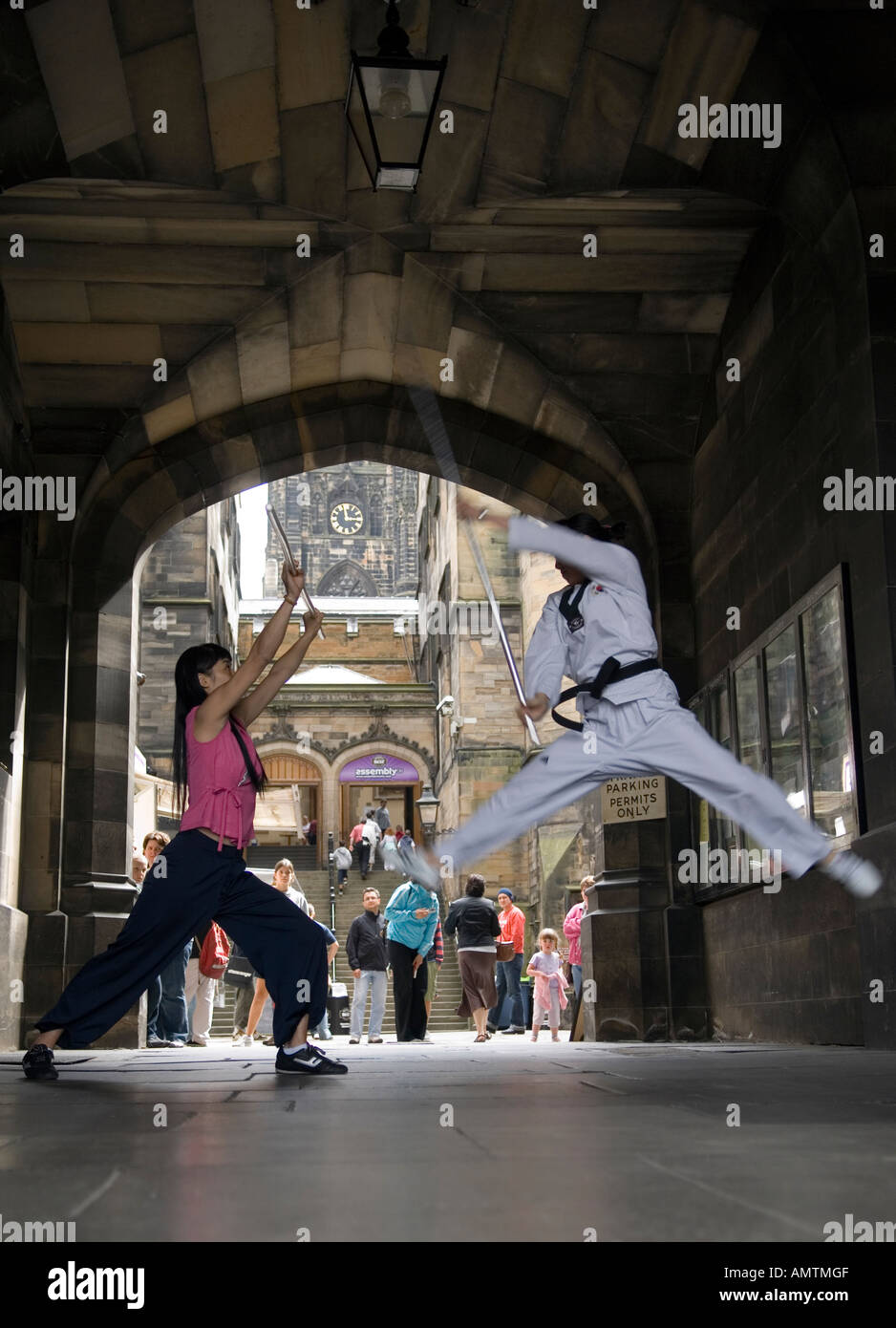 Street performance of Korean group presenting their martial arts show Jump in Edinburgh Stock Photo