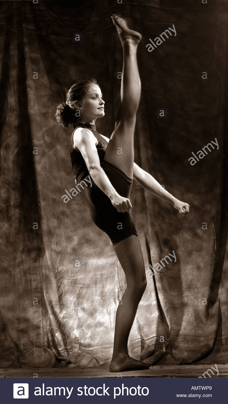 Woman Kicking Leg Up High Resolution Stock Photography and Images Alamy