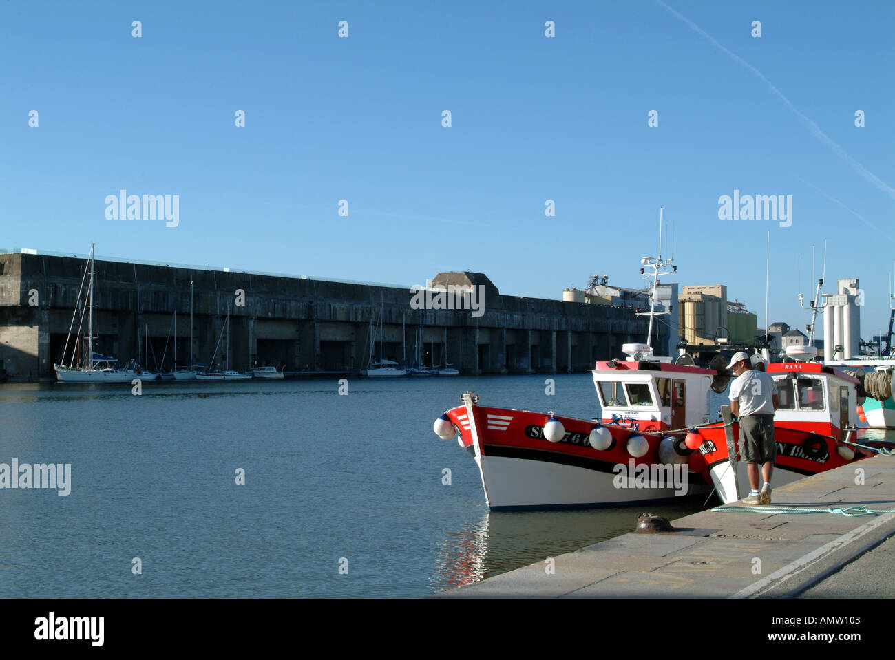 Fishing harbour and wartime submarine base St Nazaire France Stock Photo