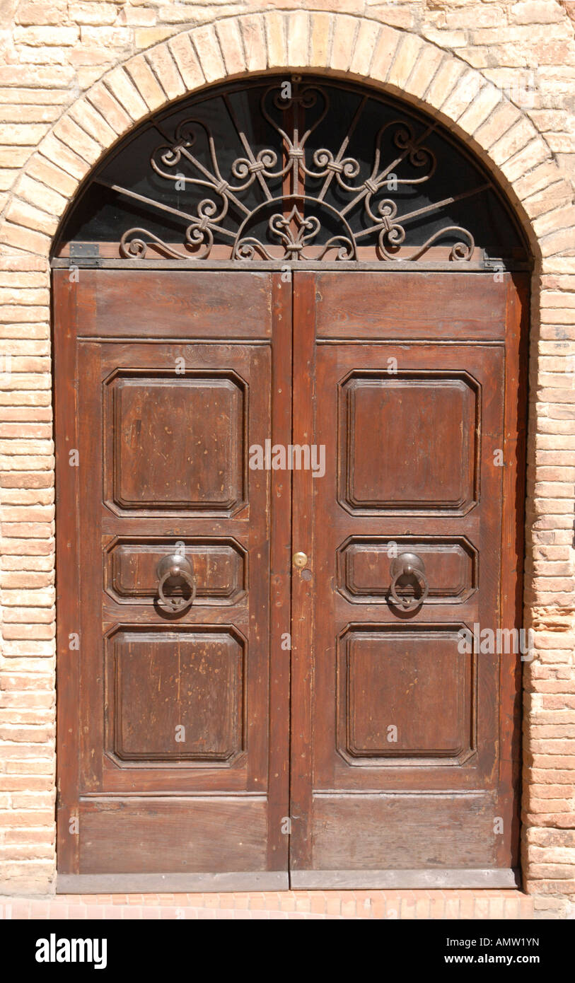 Ornate wooden double doors hi-res stock photography and images - Alamy