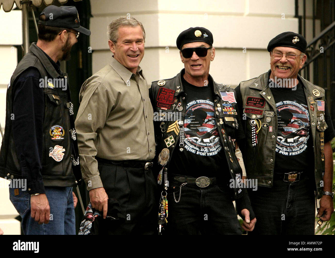 President GW Bush greets Artie Muller president of Rolling Thunder on the South Lawn of the White House. Stock Photo