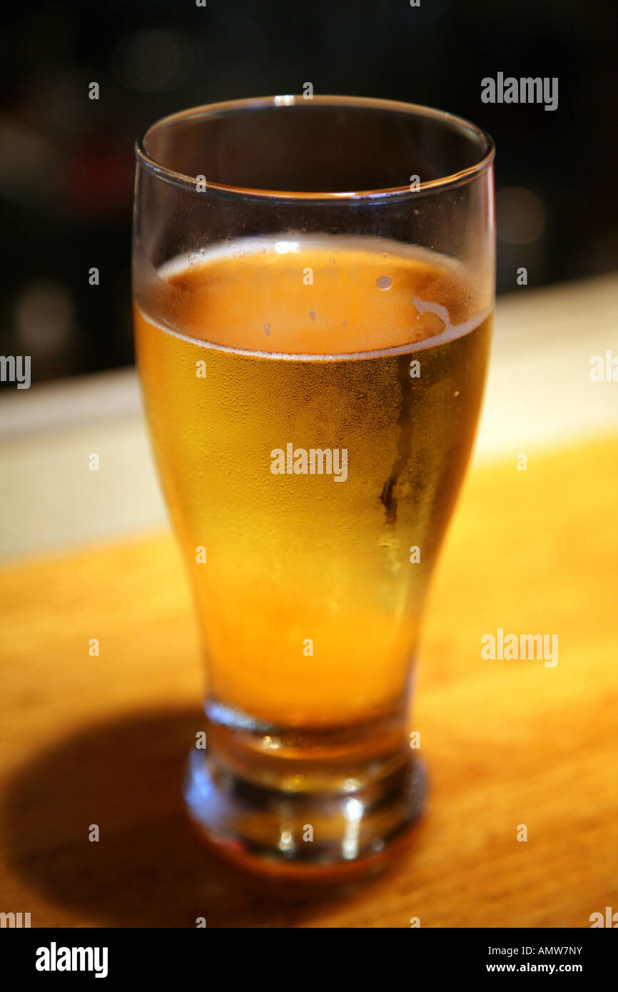 Beer in glass which has been frosted Stock Photo Alamy