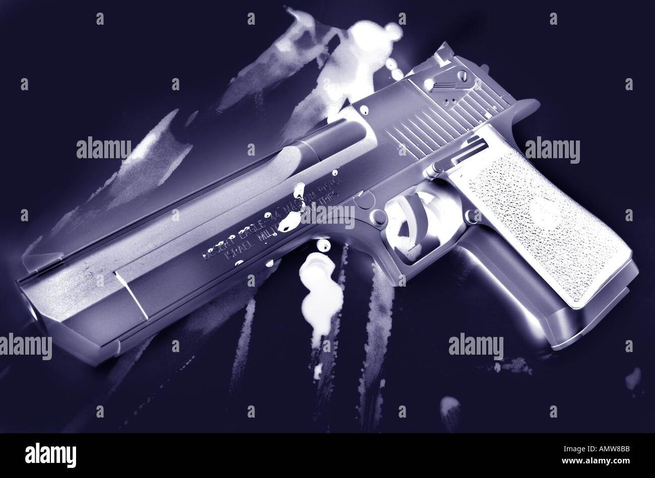 a negative of a desert eagle gun pistol with blood stains Stock Photo