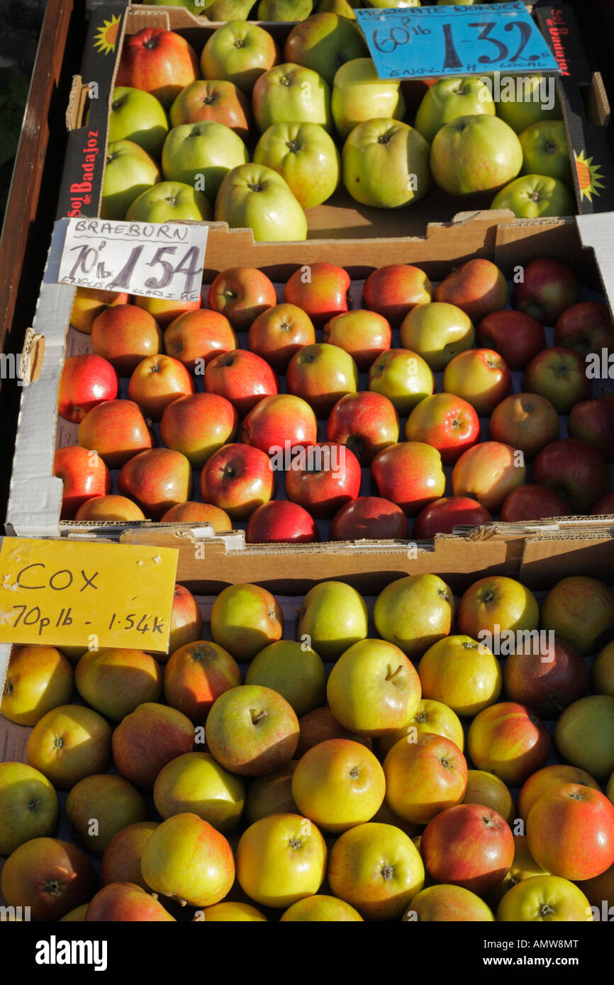 Boxes of apples on sale outside a greengrocers. Stock Photo