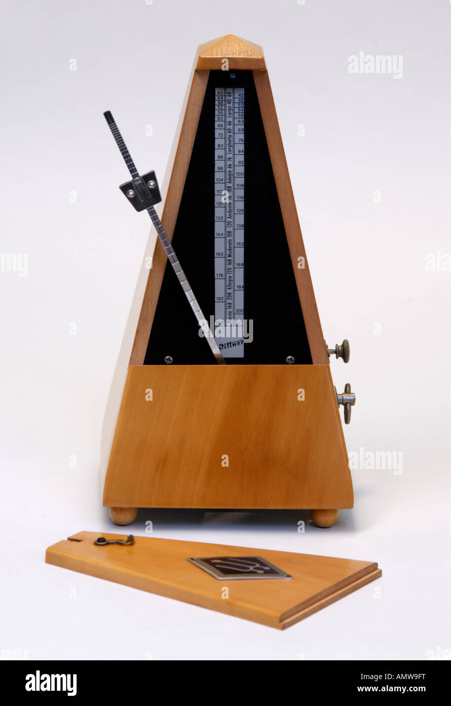 Wittner beechwood clockwork metronome with cover removed. Made in Germany . Stock Photo