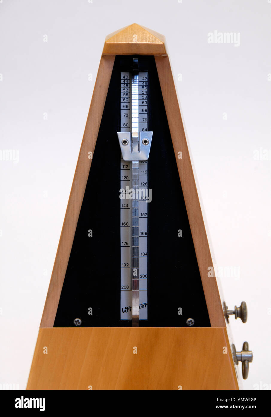 Wittner beechwood clockwork metronome with cover removed . Made in Germany . Stock Photo