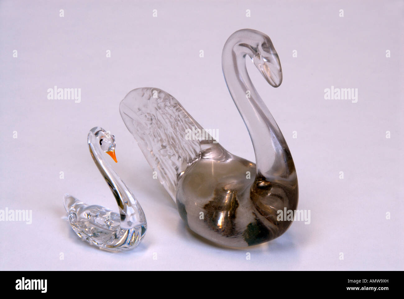 Pair of ornamental glass swans Stock Photo Alamy