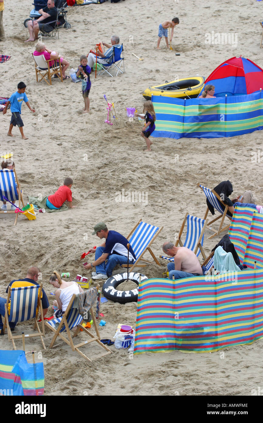 Family on a british beach hi-res stock photography and images - Alamy