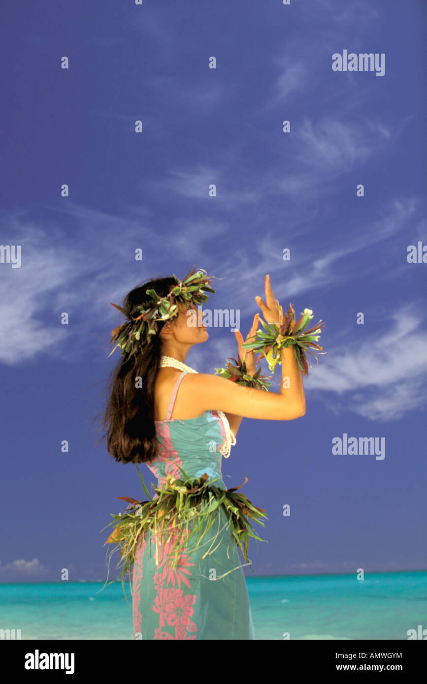 USA, Hawaiian Islands. Woman in traditional costume doing hula dance on  beach Stock Photo - Alamy