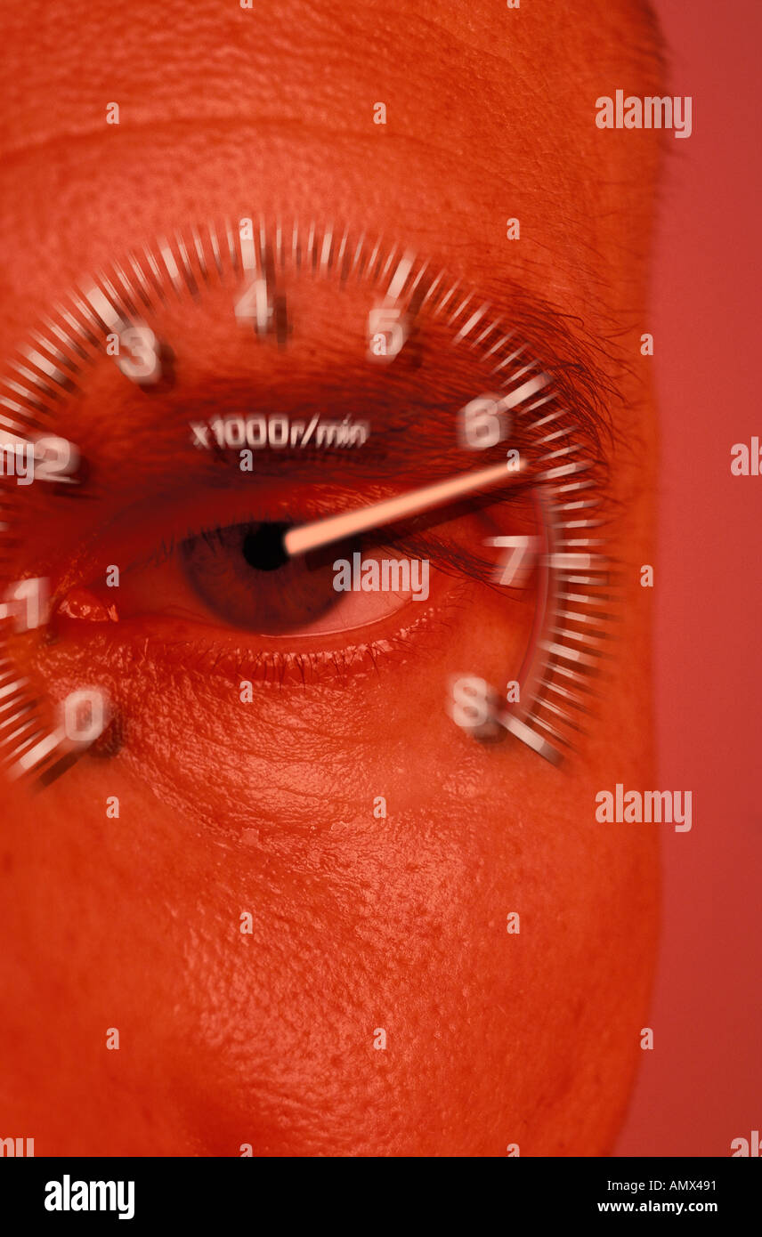 Rev counter on man's eye (red tone) Stock Photo