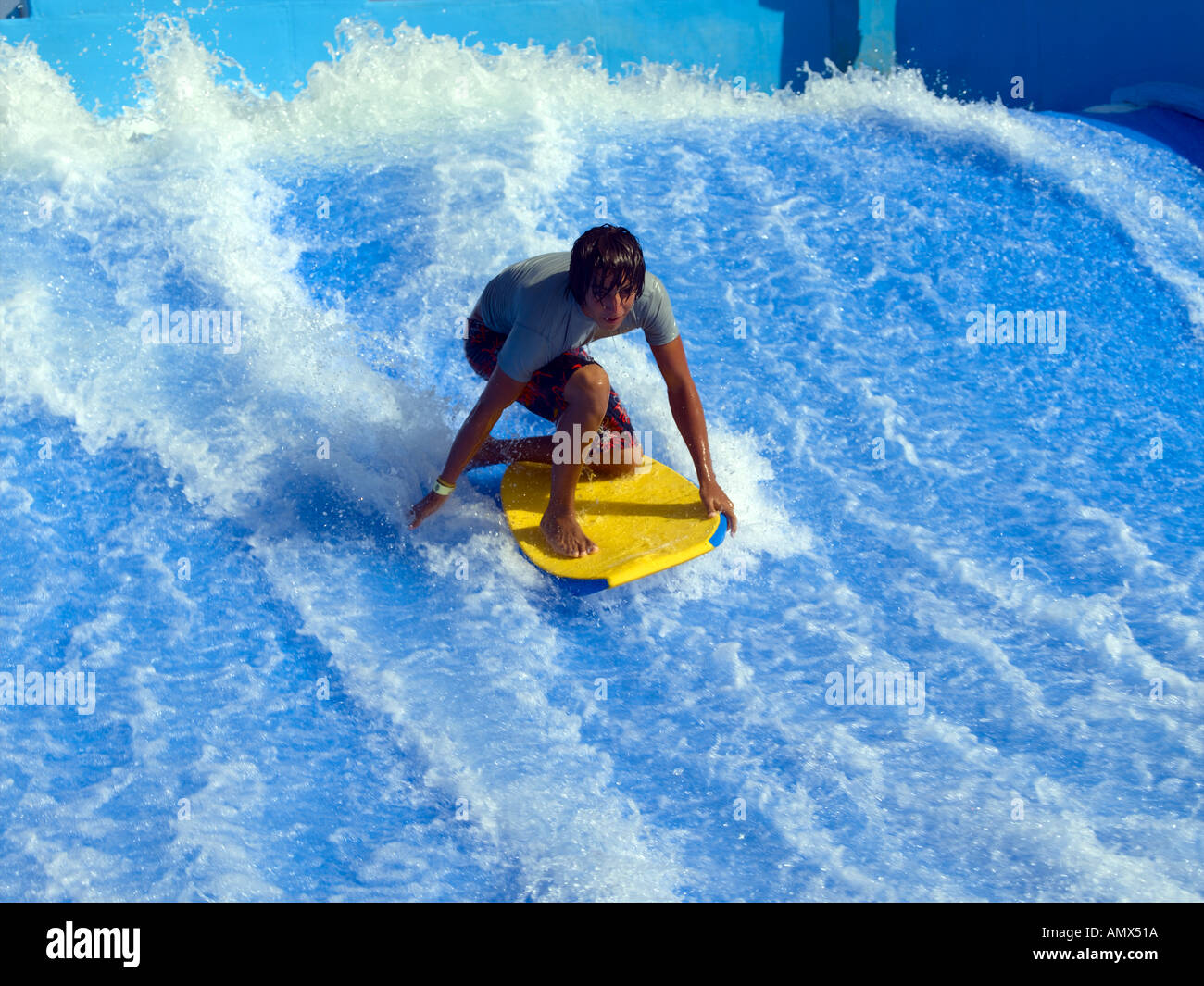 Cancun, Boy On Surf Machine Stock Photo Alamy