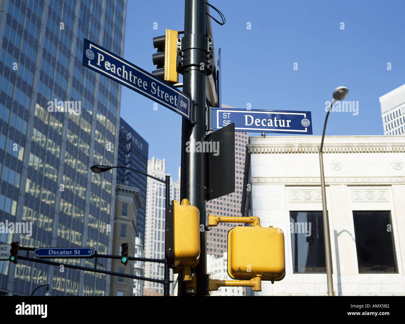 A confusing pair of street signs showing two of the 71 Peachtree street and  road names known in Atlanta Stock Photo - Alamy