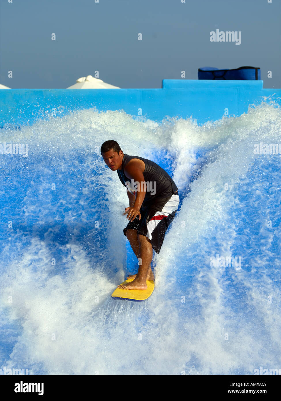 Cancun, Man On Surf Machine Stock Photo Alamy