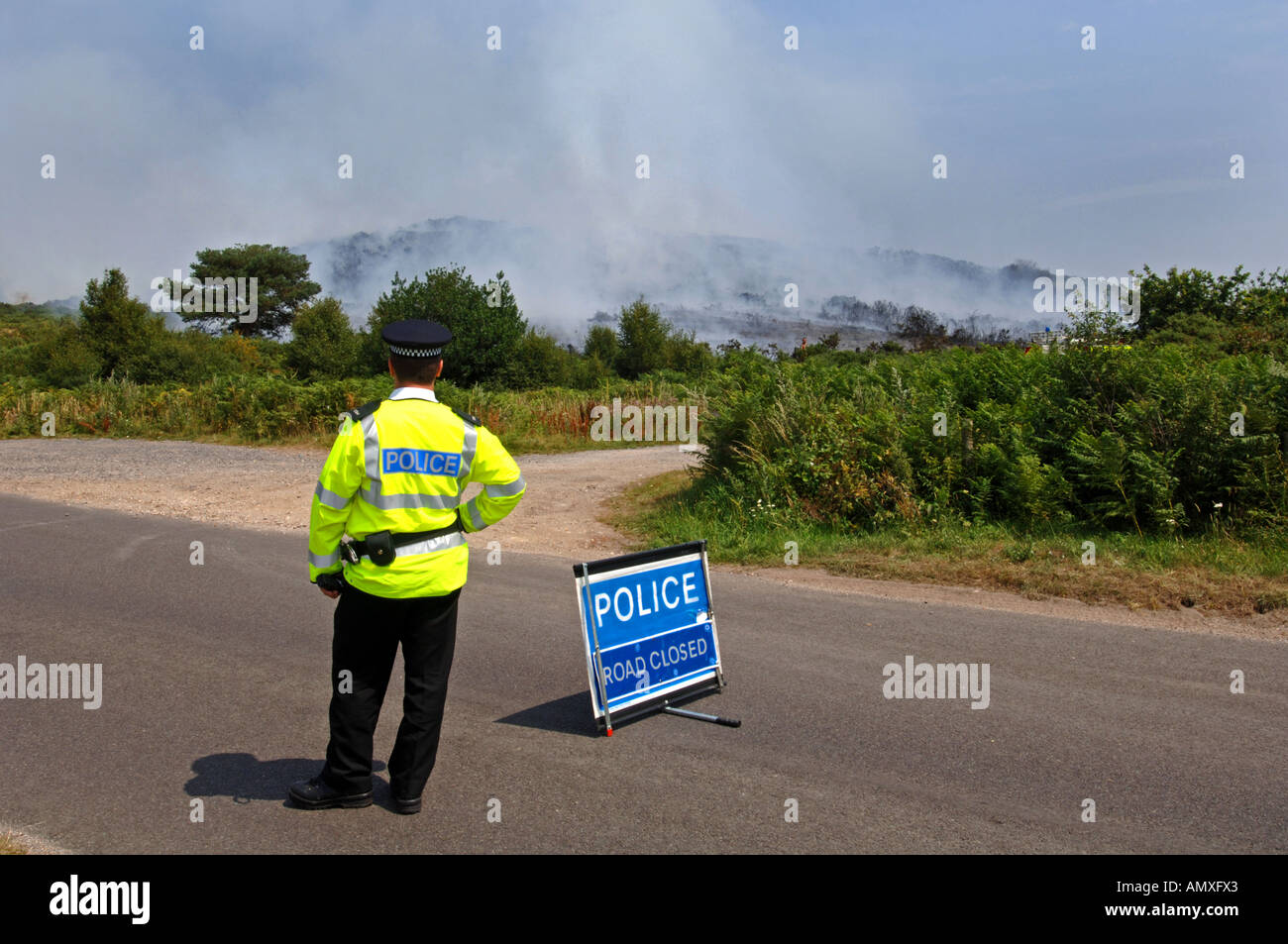 Police road block at the scene of a heath fire in Dorset Britain UK Stock Photo