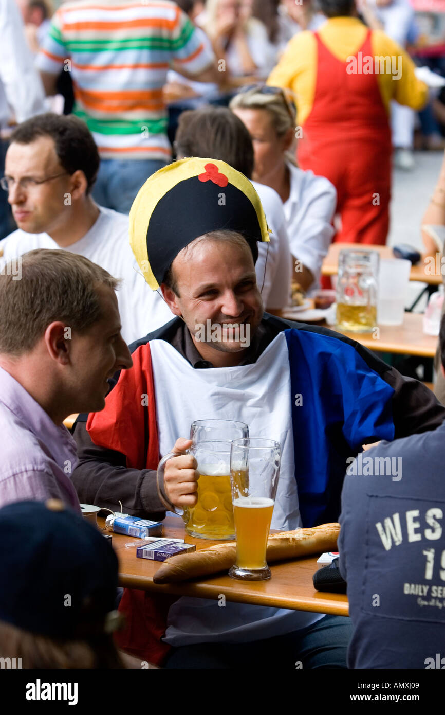 Germany Munich People Sitting In A Beer Garden Called Seehaus