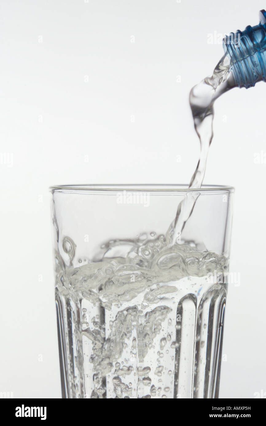 Closeup of water being poured into glass Stock Photo Alamy