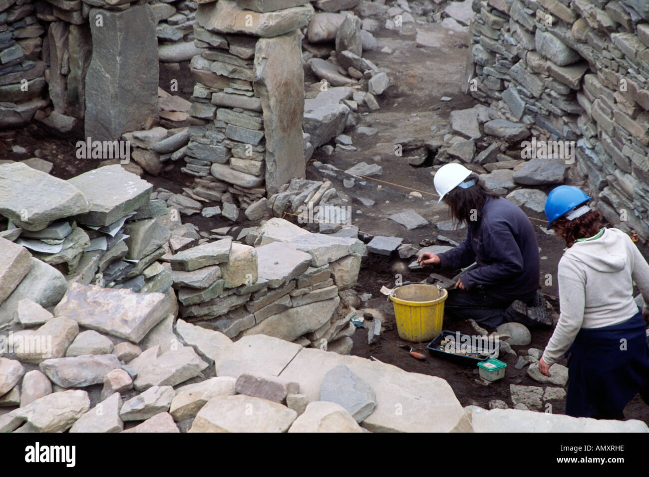 Archaeologists working on active dig Scatness Iron Age Village Shetland