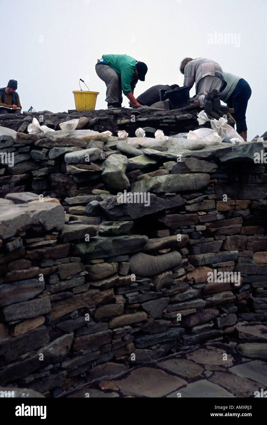 Archaeologists working on active dig Scatness Iron Age Village Shetland