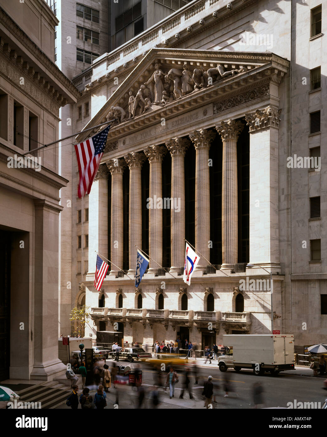 American flag out side of stock exchange building, New York Stock Exchange, New York City, New York State, USA Stock Photo