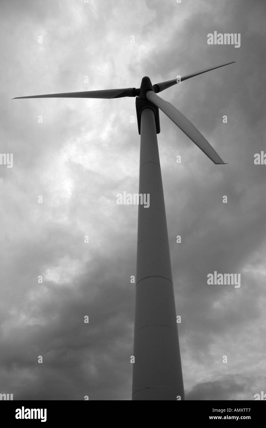 Wind turbine under cloudy skies Stock Photo - Alamy