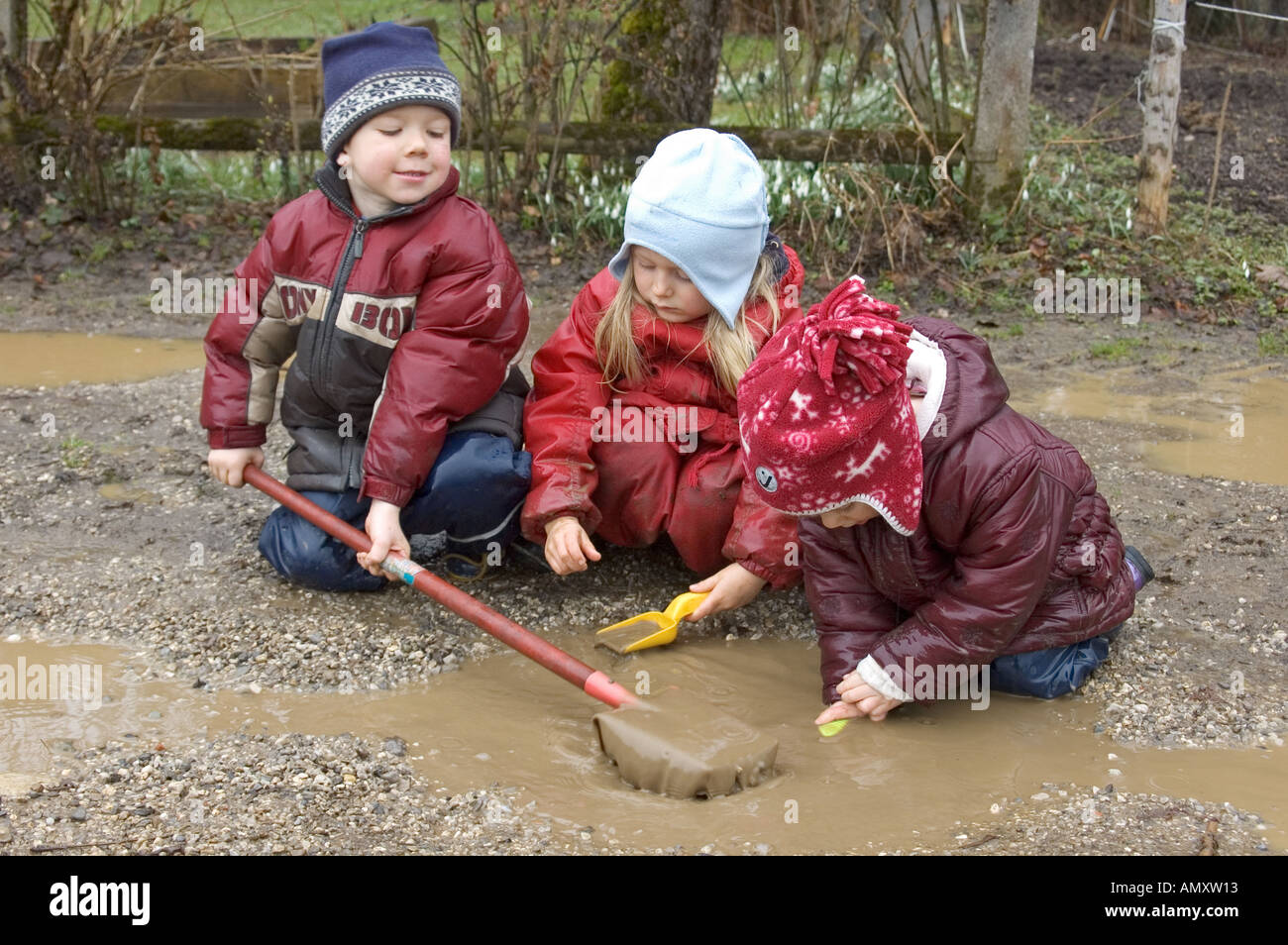 Mr Children Are Playing During Bad Weather And Rain In Puddle And Mud Sludge Stock Photo Alamy Mr Children Are Playing During Bad Weather And Rain In Puddle And Mud Sludge Stock Photo Alamy