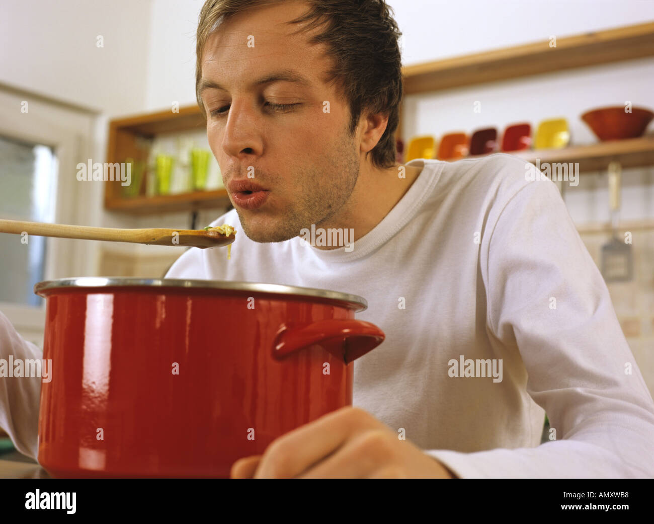youngman cooking Stock Photo