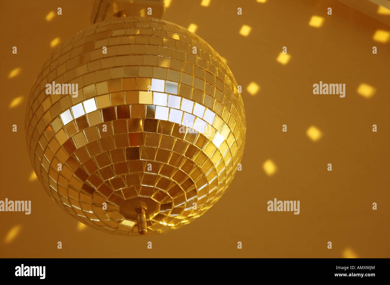 rotated shiny golden mirror ball in Stock Photo Alamy