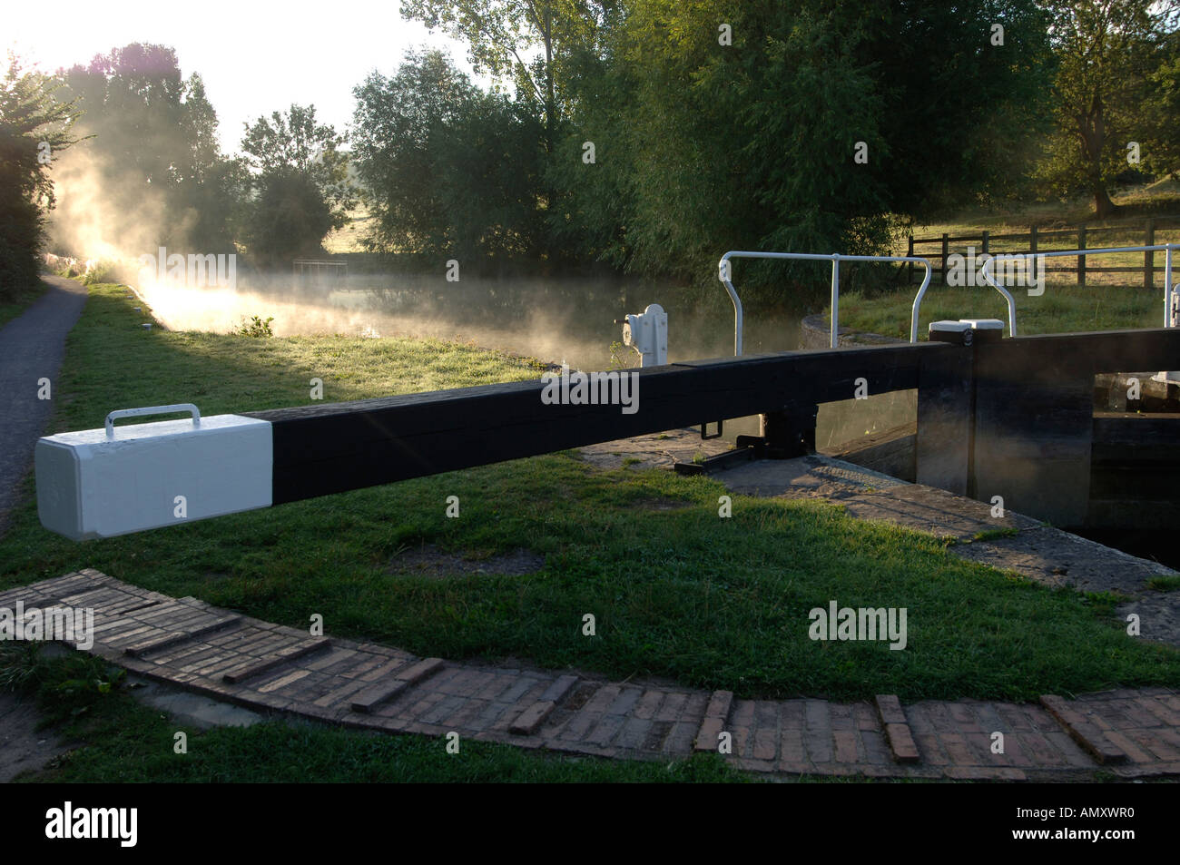 A lock gate as the early mist clears on the canal near Bradford on Avon Stock Photo