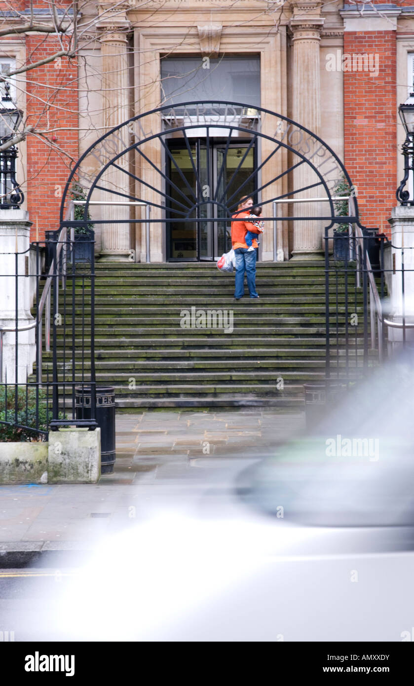 Woman and baby climbing steps to Royal Marsden Hospital Stock Photo