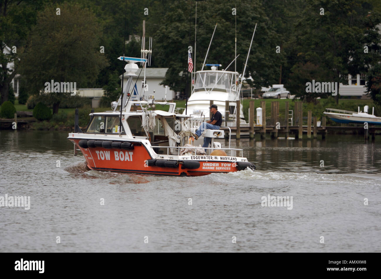 Red Tow Boat going home, Chesapeake Bay Stock Photo