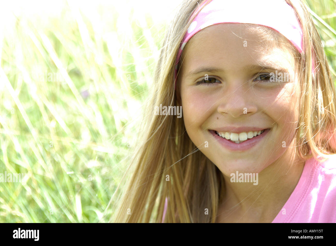 Portrait of girl smiling Stock Photo - Alamy
