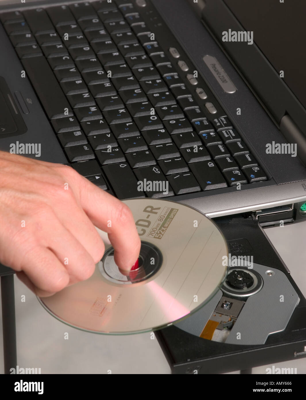 How to put a CD or DVD into your computer