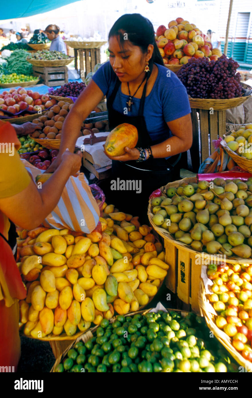 Mexican woman, food vendor, seller, selling, fruit, fruits, Friday