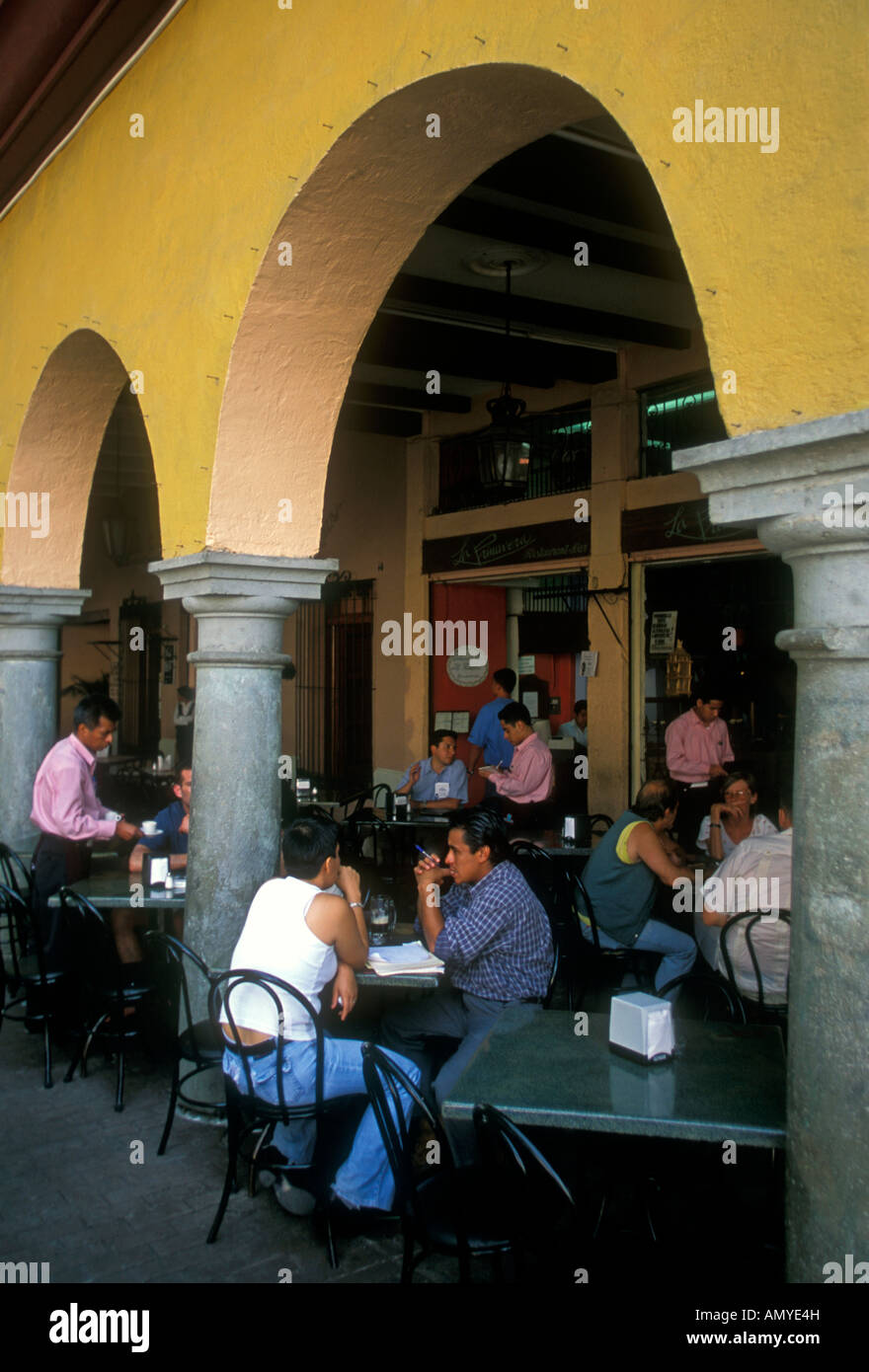Mexican people eating outdoor dining at Mexican restaurant Mexican food and drink in the main square in Oaxaca de Juarez in Oaxaca State in Mexico Stock Photo