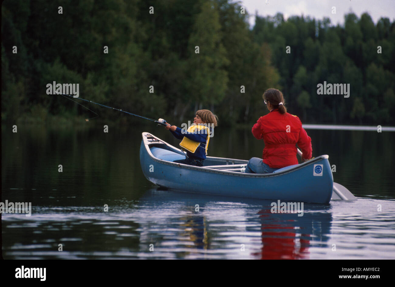 Mother Boy Fishing in Canoe Nancy Lake SC AK Stock Photo Alamy
